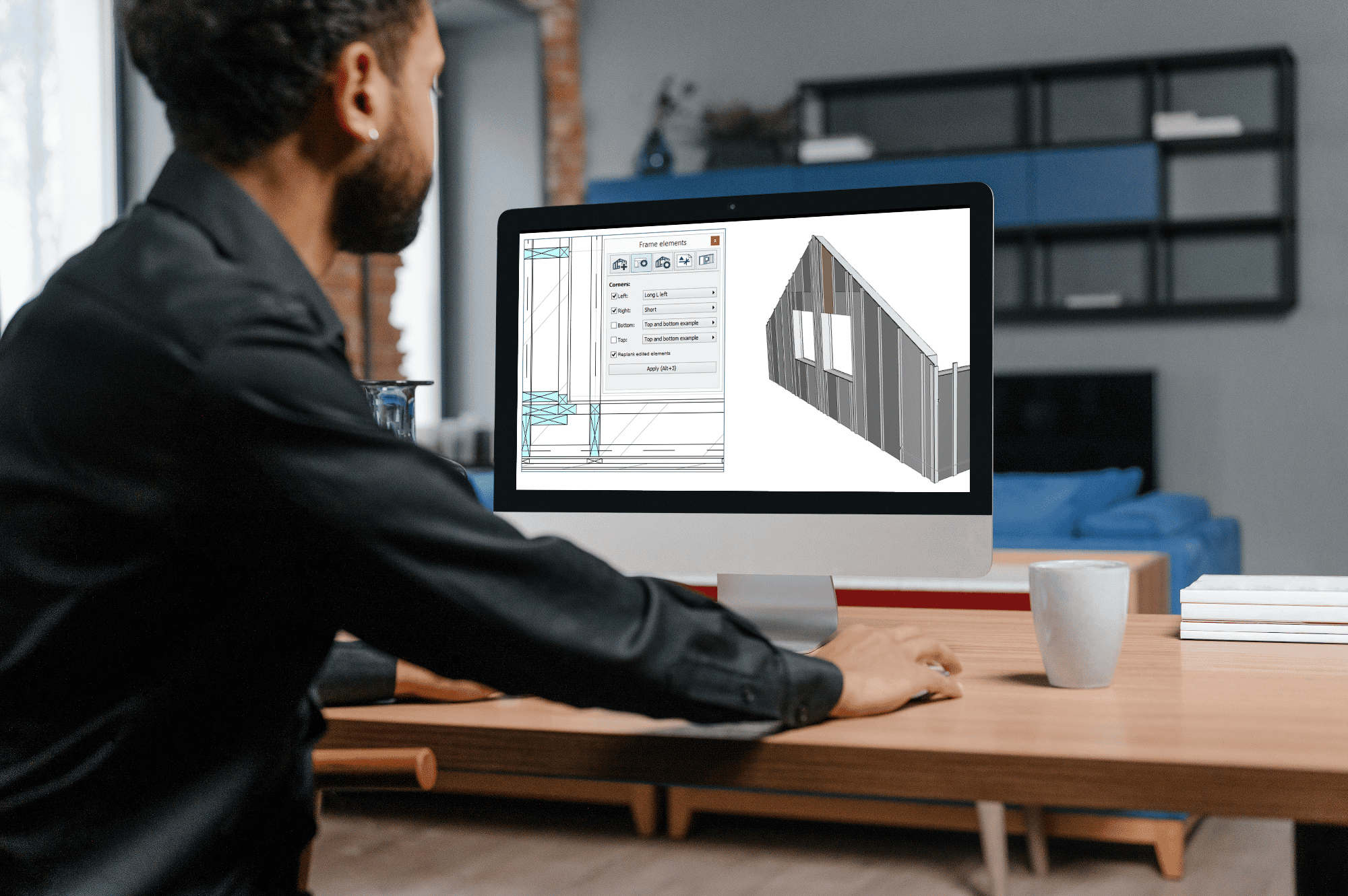 African-American man using an iMac in the office_archiframe_3-1
