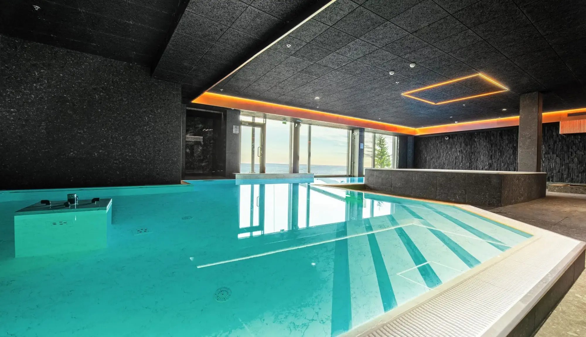 Dark shades dominate the spa section of Hotel Iso-Syöte.